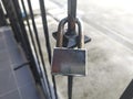 Old Locked Padlock Hanging On The Old Fashioned Metal Gate Royalty Free Stock Photo