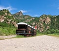 Old locomotive in mountains