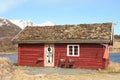 Old Lofoten's rorbu with grass on the roof