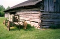 Old log barn and farm wagon