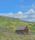 Old log cabin, abandoned in the country hillside of Rocky Mountains in Colorado Royalty Free Stock Photo