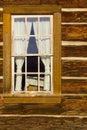 Old log cabin window Royalty Free Stock Photo