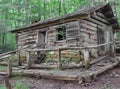 Old Log house on hill in woods. Royalty Free Stock Photo