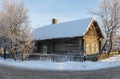 Old log house in winter time Royalty Free Stock Photo