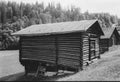 Old log huts for animal shelters in the Swiss Alps, with analogue photgraphy - 1 Royalty Free Stock Photo