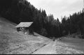 Old log huts for animal shelters in the Swiss Alps, with analogue photgraphy - 2 Royalty Free Stock Photo