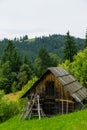 Old log shed in Ukrainian village Royalty Free Stock Photo