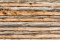 Old log wall, texture of antique wooden logs, close up decor abstraction background Royalty Free Stock Photo