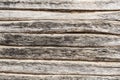 Old log wall, texture of antique wooden logs, close up decor abstraction background Royalty Free Stock Photo