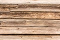 Old log wall, texture of antique wooden logs, close up decor abstraction background Royalty Free Stock Photo