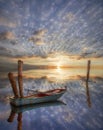 Old lonely boat in lake.