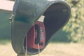 Old lonely payphone in an abandoned village Royalty Free Stock Photo