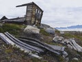 Old collapsed hut in the tundra of greenland