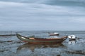 An old long fishing boat, riverside