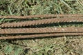 Old long rusty brown iron rods of rebar Royalty Free Stock Photo