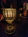 Old looking glass of wine in a tavern in Prague Czeck Republic Royalty Free Stock Photo