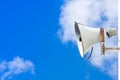 Old loudspeaker against cloudy blue sky Royalty Free Stock Photo
