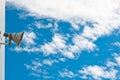 Old loudspeaker and sky Royalty Free Stock Photo