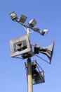 Old loudspeakers against blue sky Royalty Free Stock Photo
