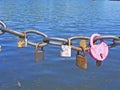 Old love will not be forgotten, hearts on the chain in river park Royalty Free Stock Photo