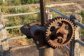 Old machine with cogs and gears.gear for open water gates near river Thailand Royalty Free Stock Photo