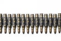 Old machine gun's bullets on white background Royalty Free Stock Photo