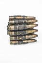 Old machine gun's bullets on white background Royalty Free Stock Photo