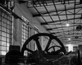 An old machine hall with large flywheels.