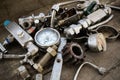 Old machine parts in machinery shop on wooden background Royalty Free Stock Photo