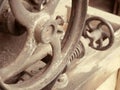 Old machinery details closeup. Rusty big wheel.