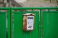 Old mailbox on the gate Royalty Free Stock Photo