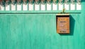 Old Mailbox on a green gate Royalty Free Stock Photo