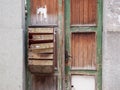 Old mailbox on the wooden door