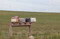 Old Mailboxes in Rural Field Royalty Free Stock Photo