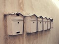 Old mailboxes on a wall