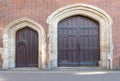 Old main and postern gate in wall Royalty Free Stock Photo