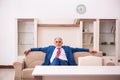 Old male boss employee coming home from work Royalty Free Stock Photo