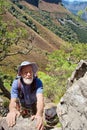 Old male climber in mountains