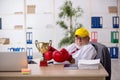 Old male employee boxer being awarded with golden cup
