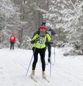 Old man with big gray beard cross country skiing Royalty Free Stock Photo