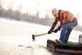 Old man in boat with ax Royalty Free Stock Photo