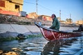 Old man on a boat in the Marshes, the swamps of Mesopotamia in Iraq