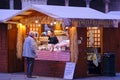 An old man buys something delicious in bright outdoor shop Royalty Free Stock Photo