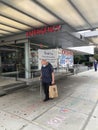 Elderly man in front of hospital in Greenwich village nyc