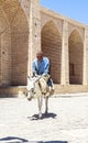 Old Man donkey riding in Kharanagh Village, Iran Royalty Free Stock Photo