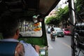 Old man driving Tuk Tuk in Bangkok of Thailand. Royalty Free Stock Photo