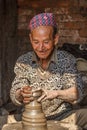 Old man enjoying his pottery work Royalty Free Stock Photo