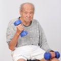 Old man exercise hold dumbbell Royalty Free Stock Photo