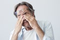 Old man with eye fatigue Royalty Free Stock Photo