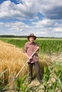 Old man in the field Royalty Free Stock Photo